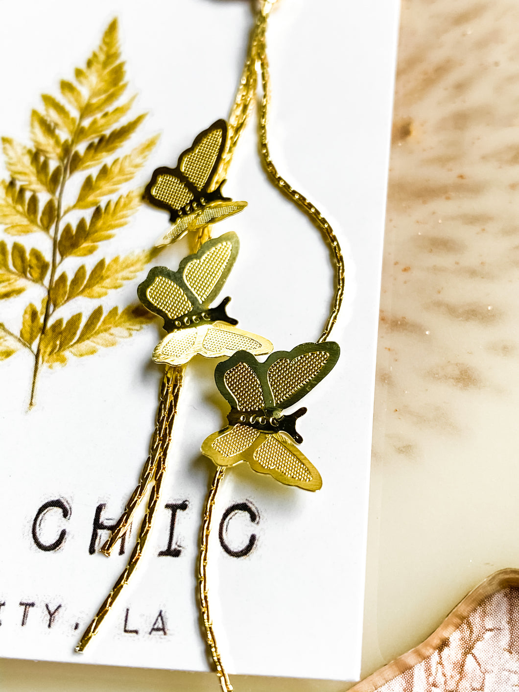 Gold butterfly earrings